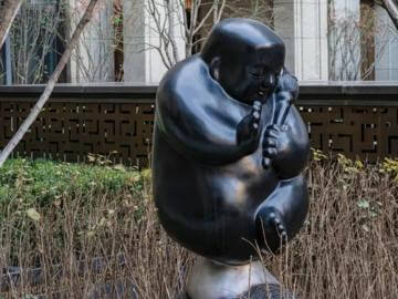 金壇小區(qū)不銹鋼小沙彌雕塑